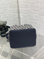 Navy flap crossbody bag with smooth leather finish and gold-tone hardware
