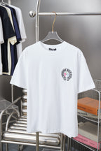 White short-sleeve T-shirt with small circular graphic logo on the chest
