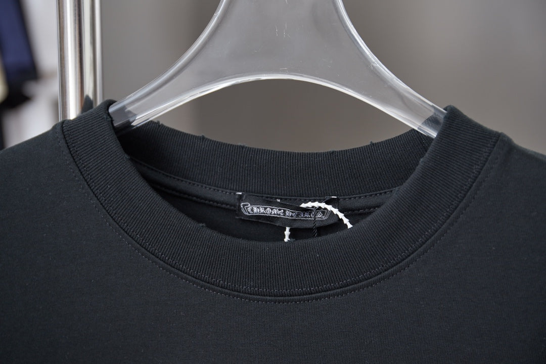 Black crewneck T-shirt with ribbed collar and inner neck label