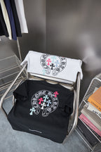 Two T-shirts on hanger set: white and black, each with circular logo