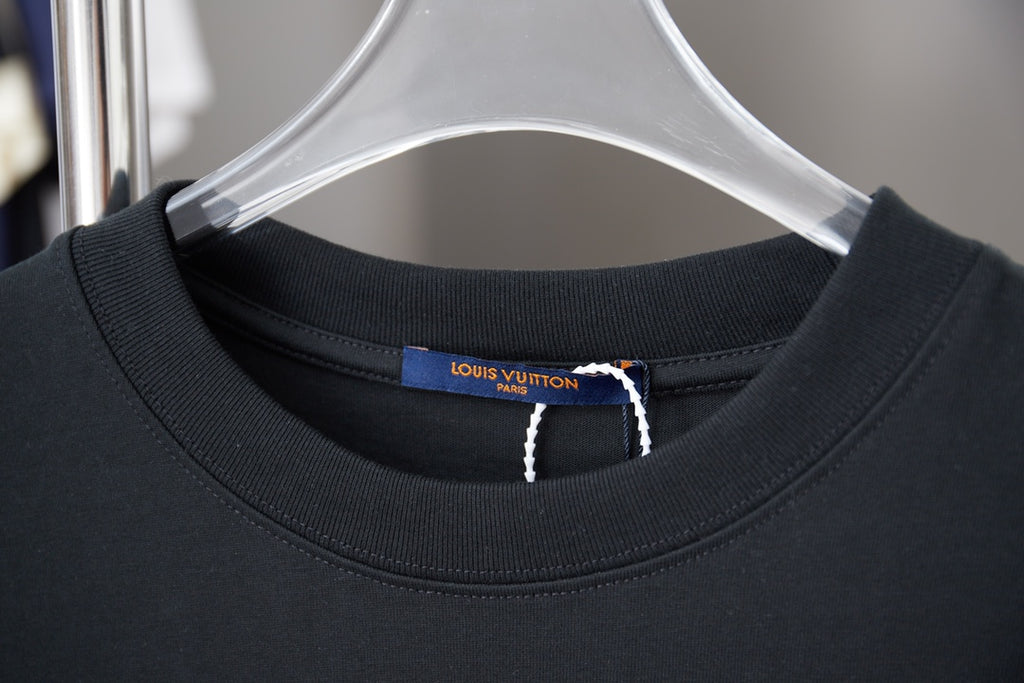 Louis Vuitton T-shirt neckline with blue brand tag