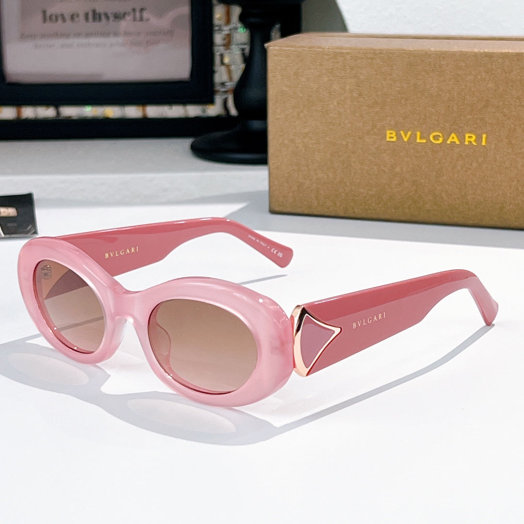 Bvlgari round sunglasses, pink frames with pink-tinted lenses and gold logo accents