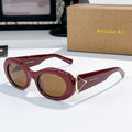 Bvlgari round sunglasses, burgundy frames with tan lenses and gold logo accents