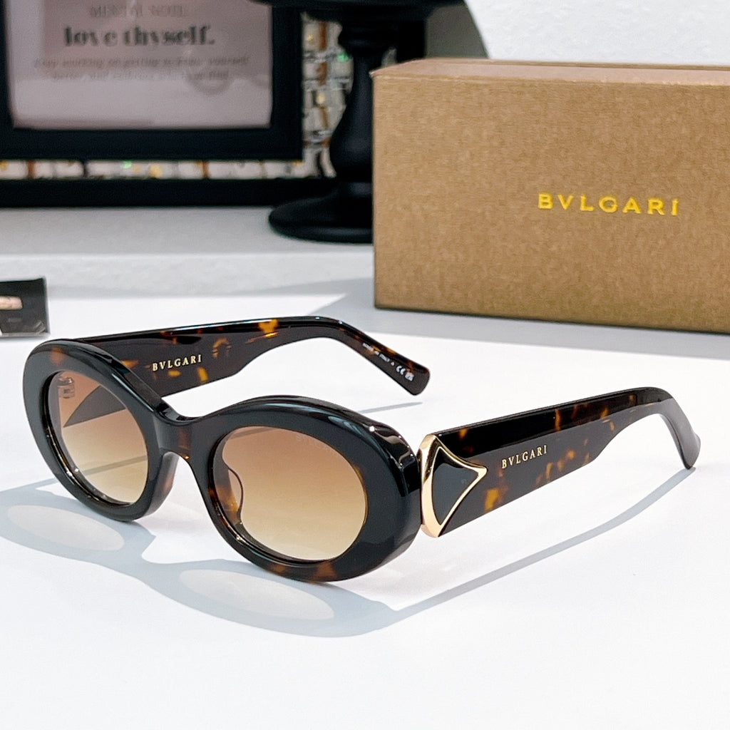 Bvlgari round sunglasses, black frames with tortoiseshell details and amber lenses