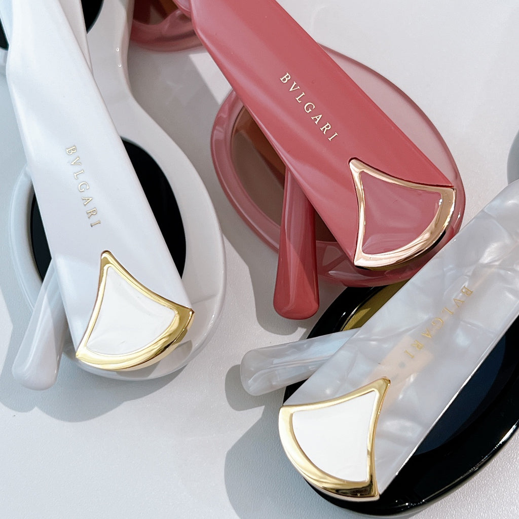 Bvlgari sunglasses, pink frames and white frames with gold triangular temple details