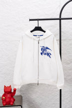 Burberry white zip-up hoodie with blue logo graphic on the chest