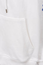White long-sleeve sweatshirt cuff and hem seam