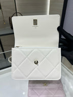 White quilted mini flap bag with top handle and gold CC clasp