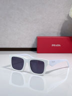 Prada square sunglasses with white frame and dark purple-tinted lenses