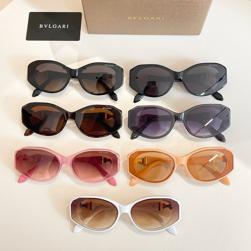 Assorted sunglasses lineup on display, with different colored frames and tinted lenses