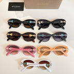 Multiple jeweled sunglasses with tinted lenses and embellished temple details