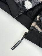 Balenciaga fleece jacket zipper and pull tab, black with white logo text