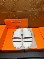 Hermes white slide sandals with two adjustable buckle straps