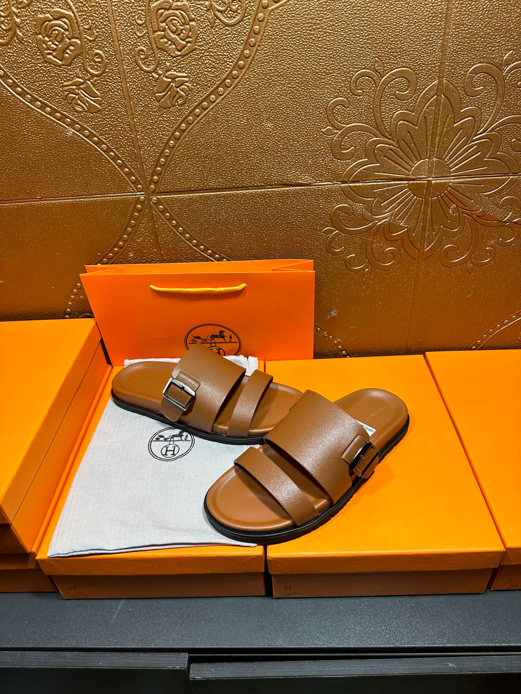 Hermes tan-brown leather sandals with two bands and buckle detail