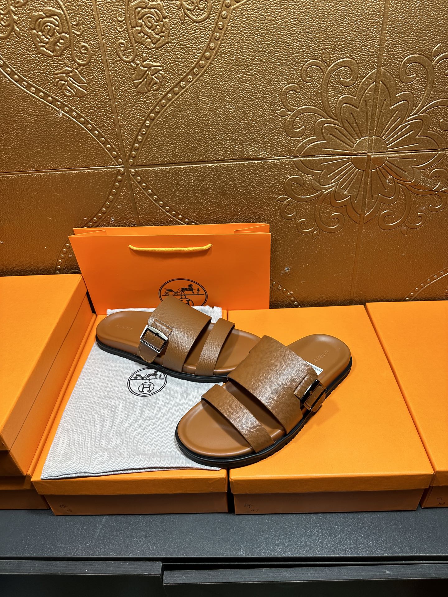 Hermes tan-brown leather sandals with two bands and buckle detail