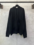 Louis Vuitton monogram hoodie in dark color with drawstring hood and front pocket