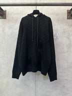 Louis Vuitton monogram hoodie in dark color with drawstring hood and front pocket