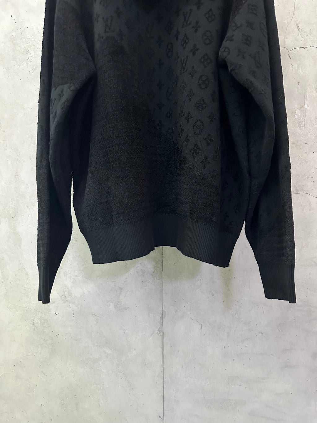 Louis Vuitton monogram hoodie side view with ribbed hem and long sleeves