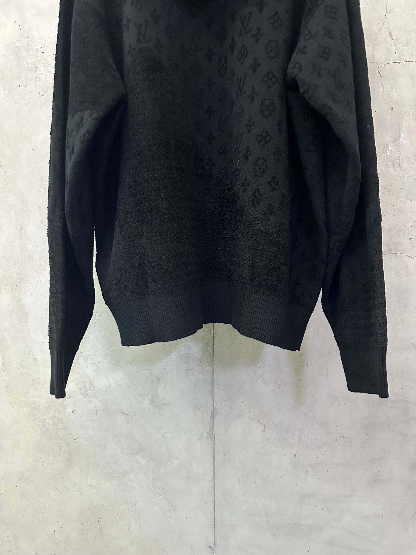 Louis Vuitton monogram hoodie side view with ribbed hem and long sleeves