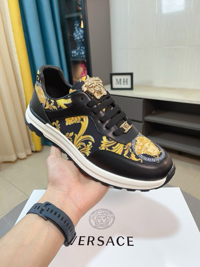 Versace lace-up sneakers, black with gold baroque print and embellished tongue, white sole