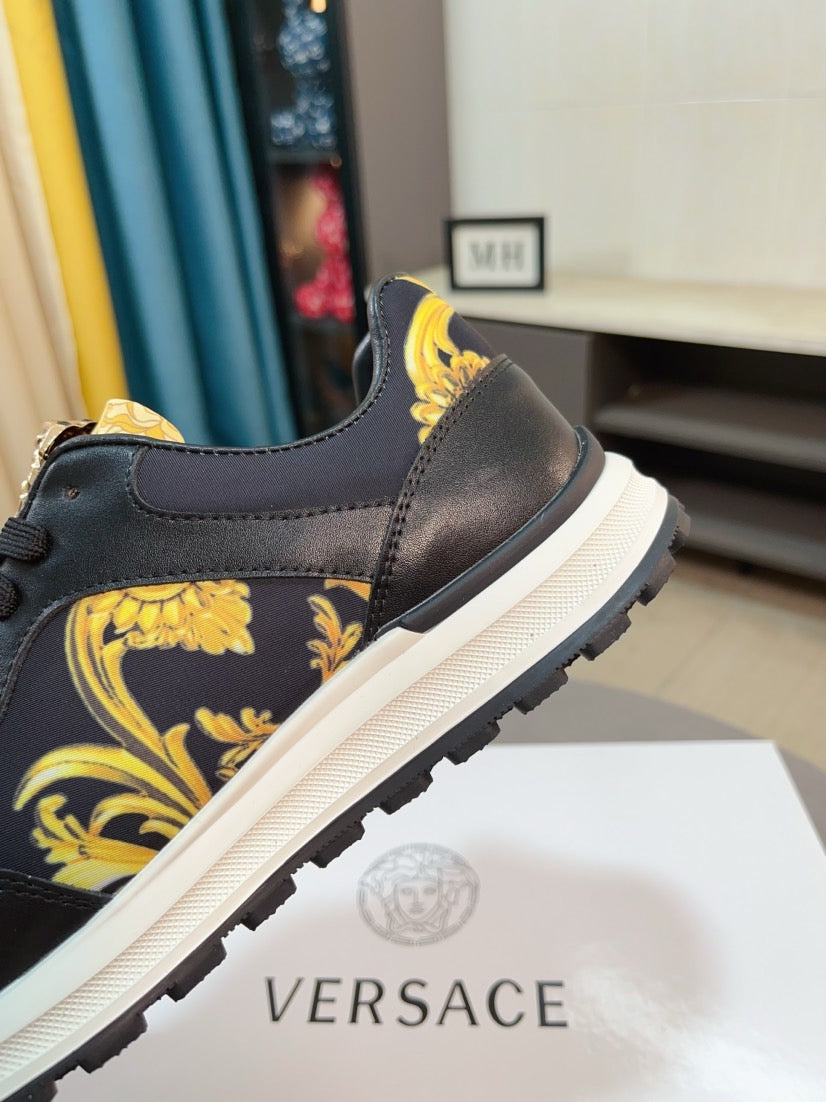 Versace lace-up sneakers, black with yellow baroque print panels and textured rubber sole