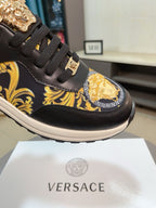 Versace sneaker, black upper with gold buckle and yellow baroque logo on side