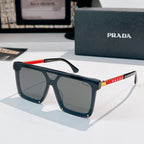 Prada sunglasses with dark navy frame and tinted dark lenses