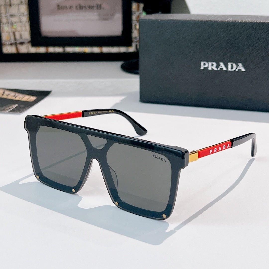 Prada sunglasses with dark navy frame and tinted dark lenses