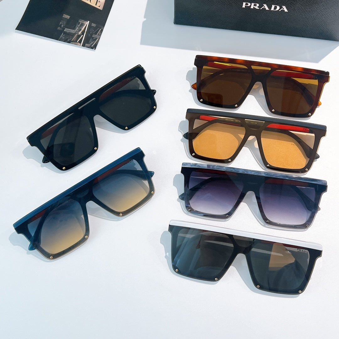 Assorted Prada sunglasses with multiple frame styles and tinted lenses