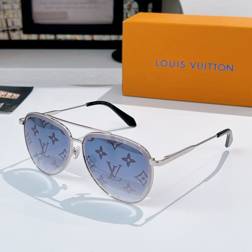 Louis Vuitton sunglasses with silver frame, light blue tinted lenses, and monogram pattern