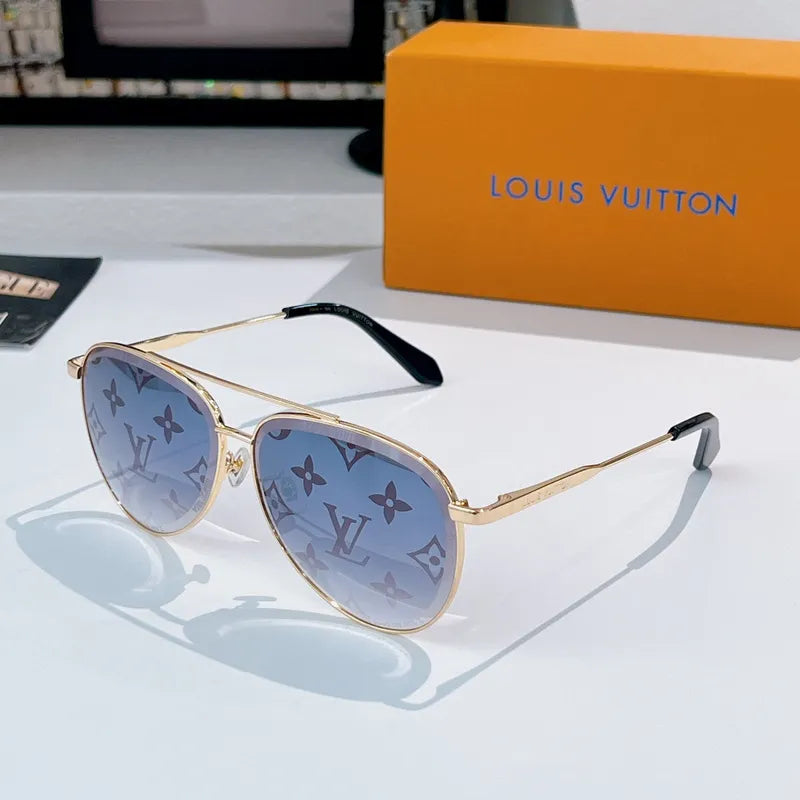 Louis Vuitton sunglasses with gold frame, blue patterned lenses, black temple insert