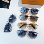 Louis Vuitton sunglasses assortment with blue and gold frames, tinted lenses, and monogram pattern