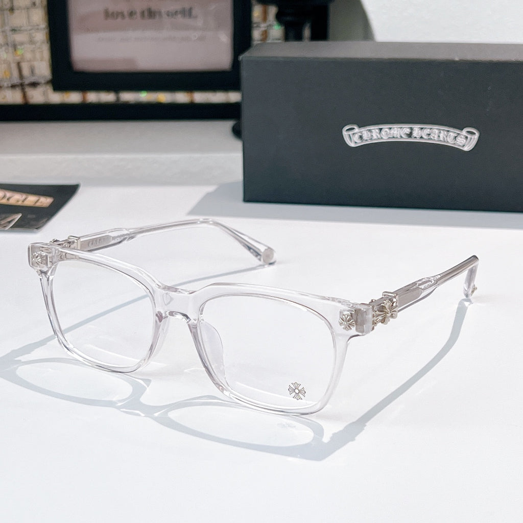 Chrome eyeglasses with clear frames, round lenses, and silver-toned metal hinges
