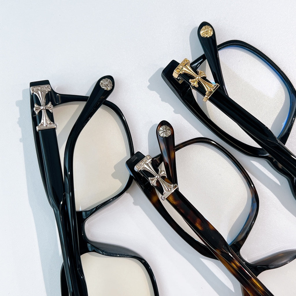 Chrome eyeglasses assortment with black frames, tortoise-pattern frames, and cross hinges