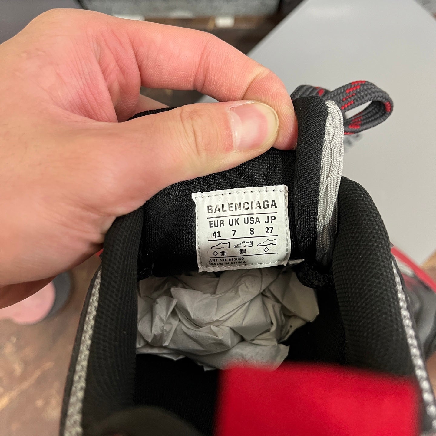 Sneaker inside size label on collar with Balenciaga text on white tag