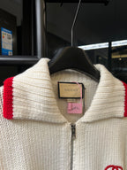 Gucci cream knit zip-up sweater neckline with tag, red stripe on shoulder