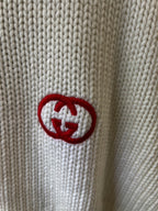 Gucci knit sweater detail with GG emblem patch in red and white