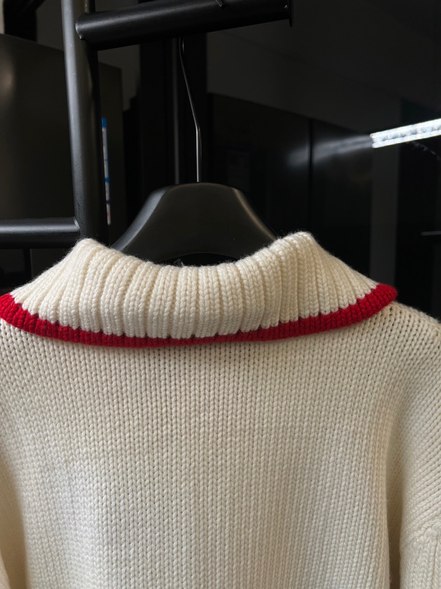 Gucci cream knit sweater back view with ribbed turtleneck and red collar trim