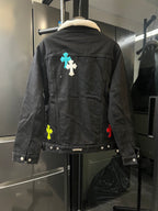 Black denim jacket with sherpa collar, blue cross patch on back, button front