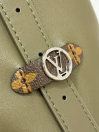 LV monogram charm and silver ring on olive green leather strap