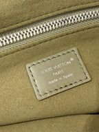 Louis Vuitton Paris patch on olive green leather bag, stitched label