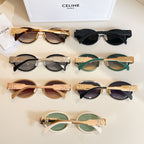 Celine glasses collection on display with mixed frames: brown, black, green, and white