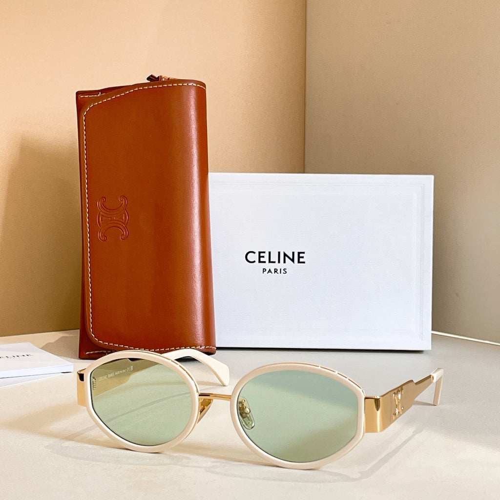Celine glasses with white frames and pale green tinted lenses