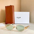 Celine glasses with white frames and pale green tinted lenses