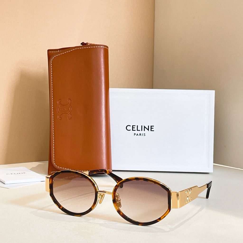 Celine glasses with tortoiseshell round frames and amber tinted lenses