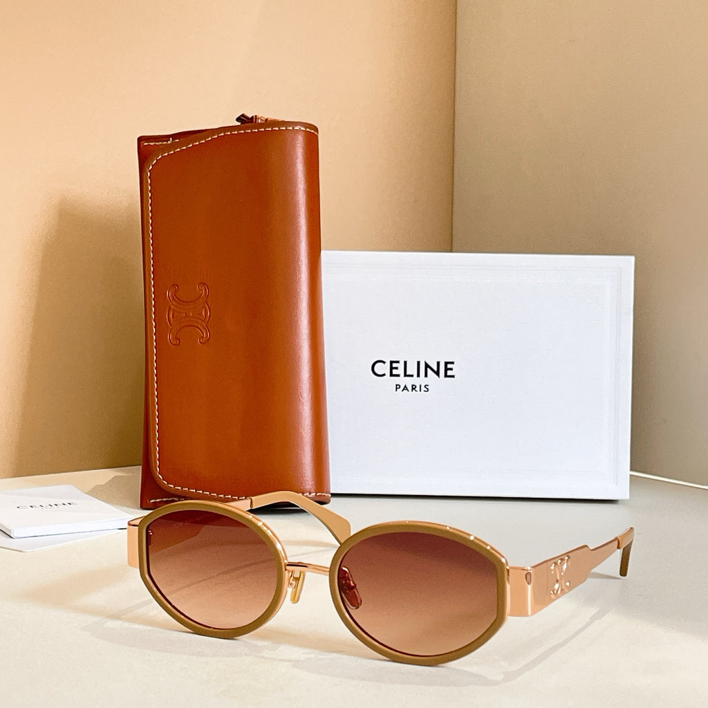 Celine glasses with gold round frames and brown gradient lenses