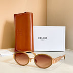 Celine glasses with gold round frames and brown gradient lenses