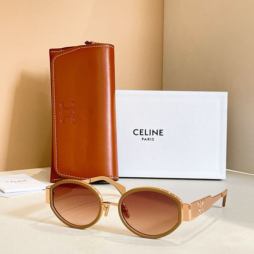 Celine glasses with gold round frames and brown gradient lenses