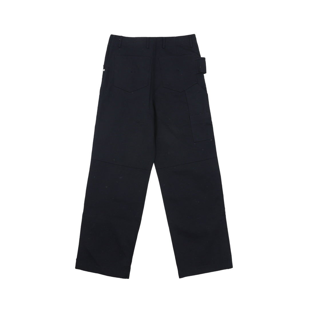 Dark navy wide-leg pants with side patch pockets and button closure