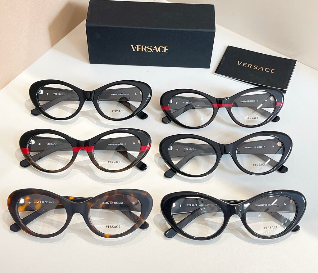 Assorted round eyeglasses with clear lenses in dark and tortoiseshell frames